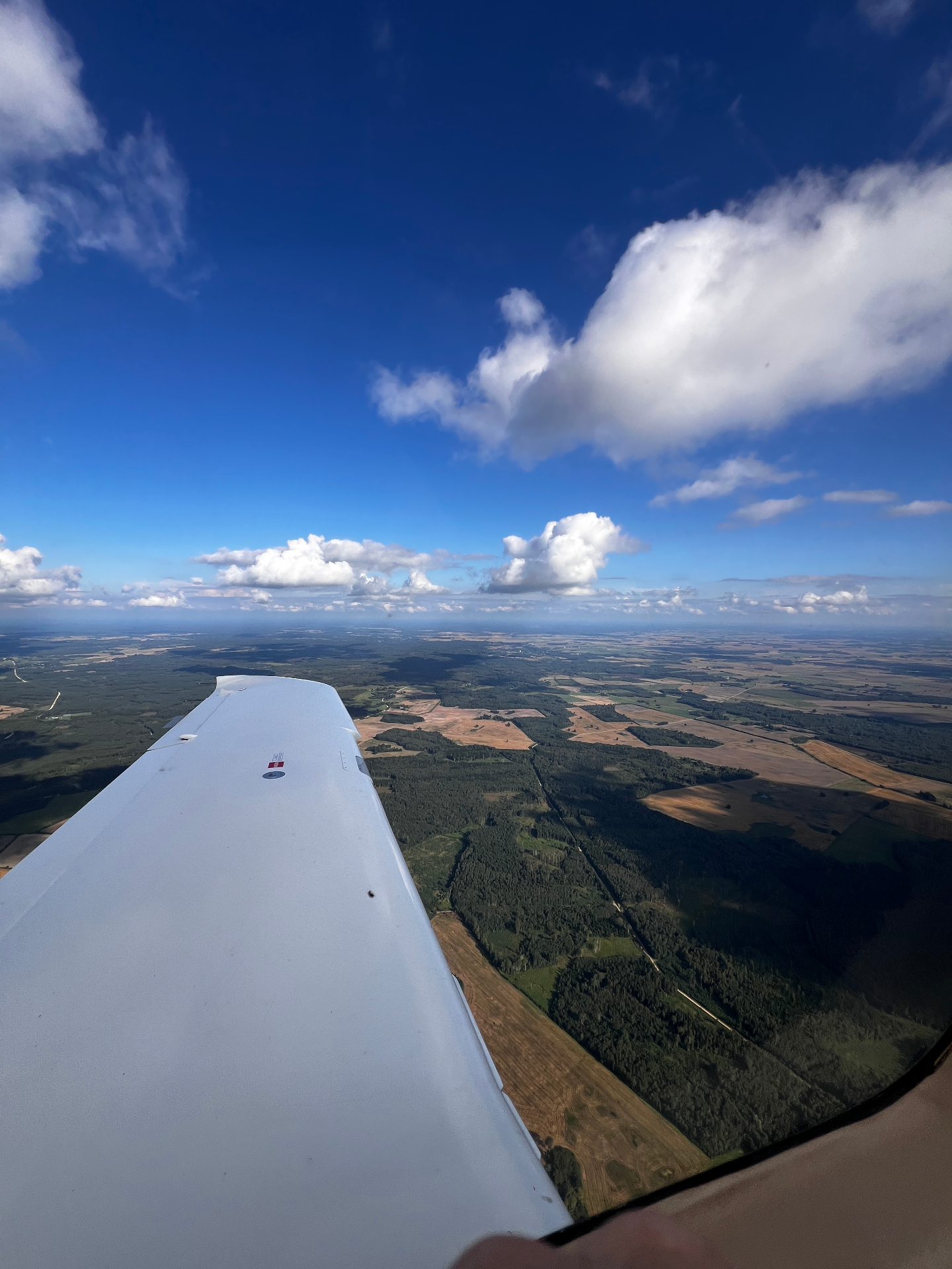 Wing over fields